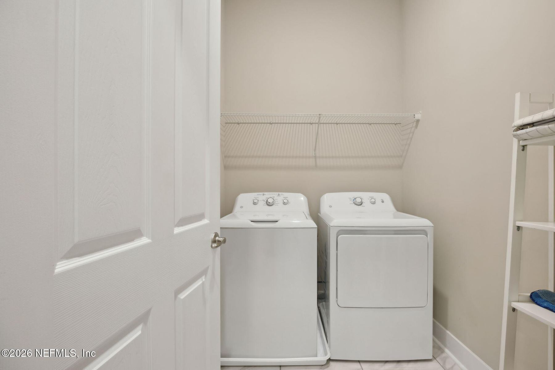 Laundry and utility room with washer and dryer